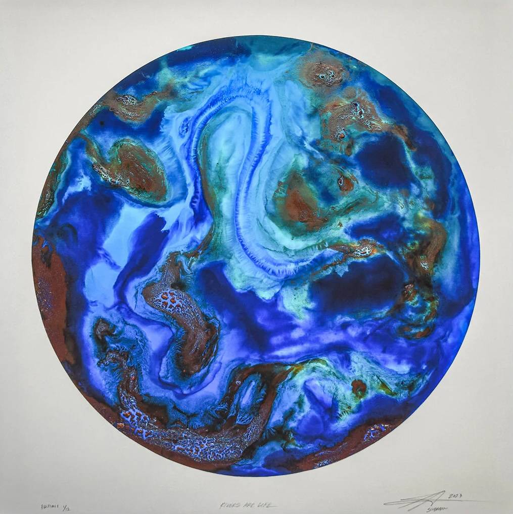 A round abstract image which resembles planet Earth.